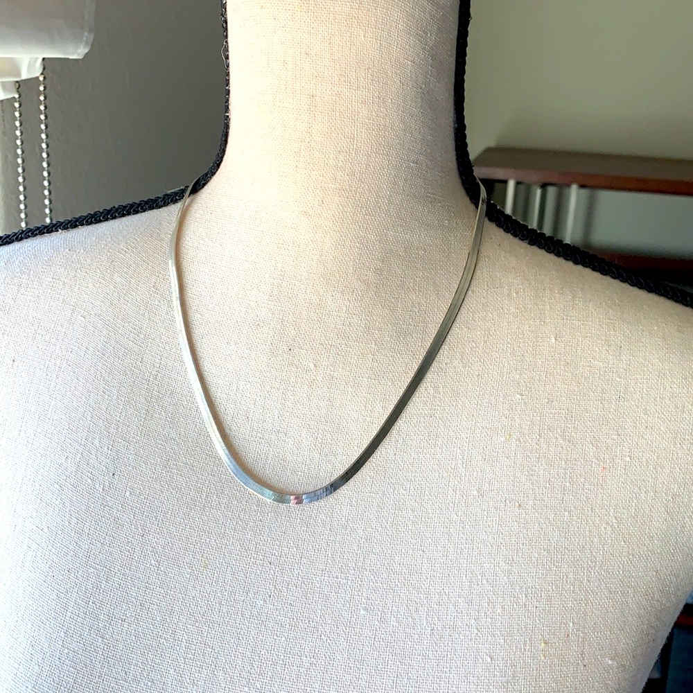 Silver herringbone 20” chain.